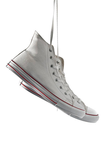 istock New Sneakers Hanging by Shoelaces 184302491