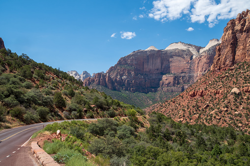 The Zion National Park valley with a road in the foreground