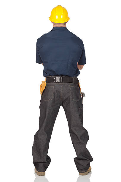 Rear view of a manual worker Rear view of a manual workerhttp://www.twodozendesign.info/i/1.png legs apart stock pictures, royalty-free photos & images