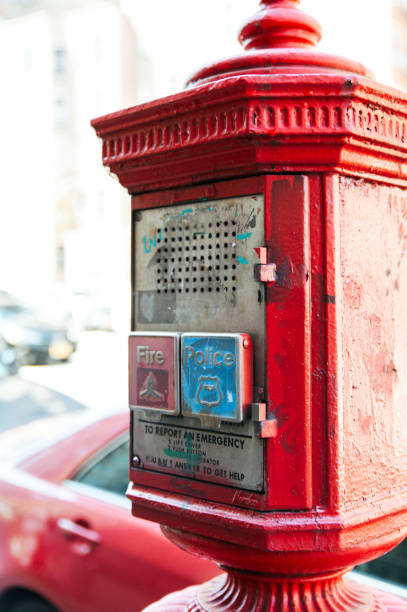 istock Old red telephone box on street 1843027531