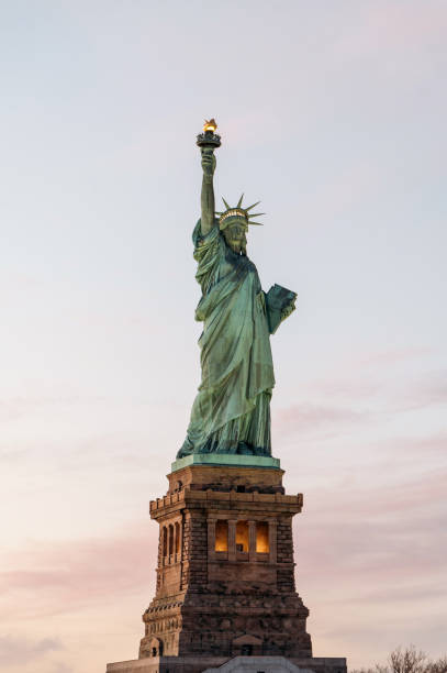 istock Statue of Liberty against gray sky 1843030119