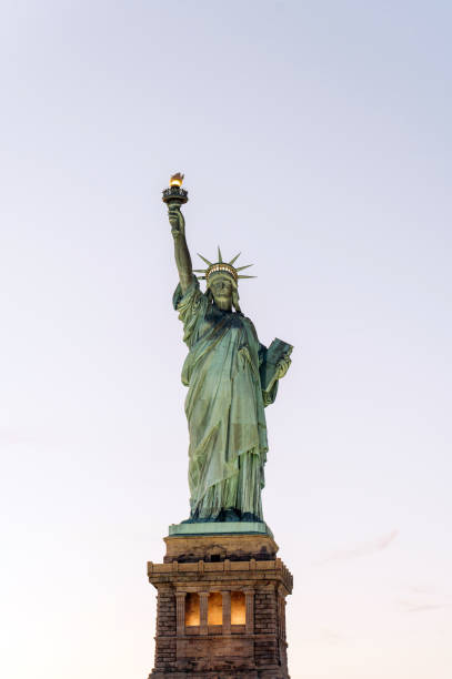 istock Statue of Liberty against gray sky 1843031678