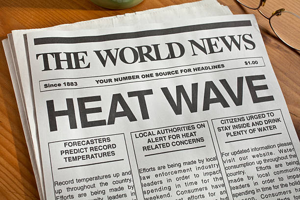 istock A newspaper with heat wave headlines in bold 184303329
