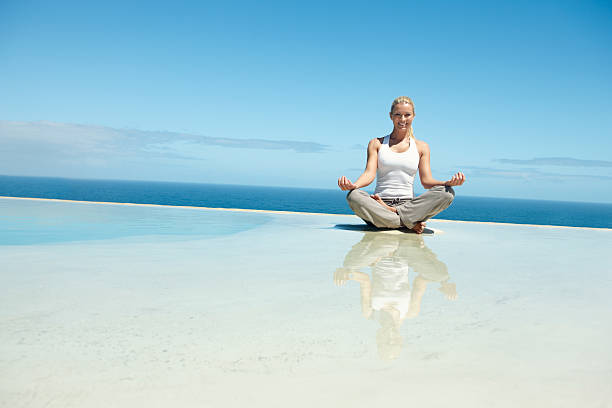 istock Woman doing yoga 184303788