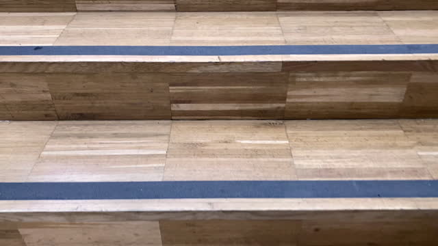 Moving up on a marble tiled staircase