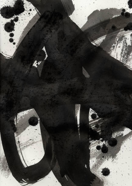 Black ink brush stroke on white paper background