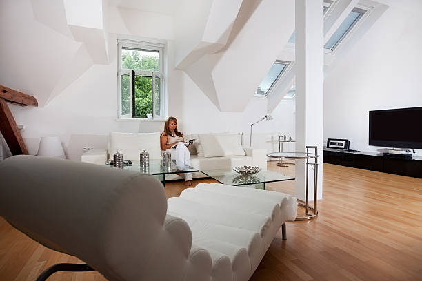 Middle aged woman in her nice attic flat