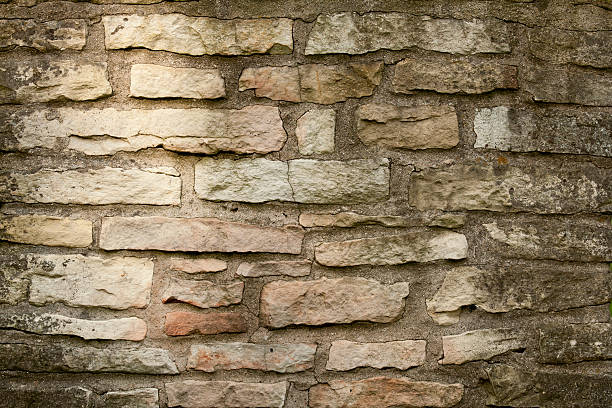 old stone chimney background stock photo