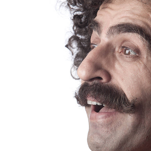 istock Side view of man with mustache shocked on white background 184304991