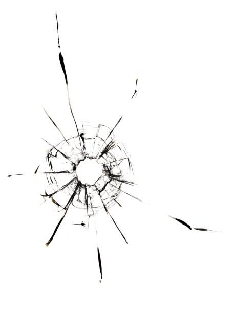 istock Texture of broken glass on a white background. A hole in the window. 1843058122