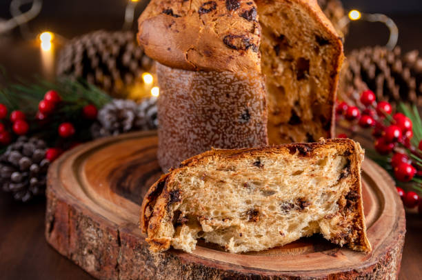 istock Traditional Christmas panettone (Chocottone) on wooden table. 1843062300