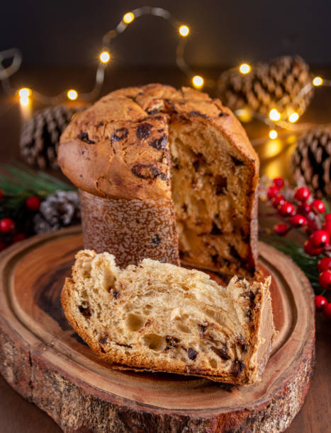 istock Traditional Christmas panettone (Chocottone) on wooden table. 1843064896