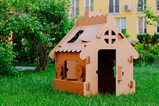 Cardboard toy house for children. Eco-friendly Box for pet or carton playhouse