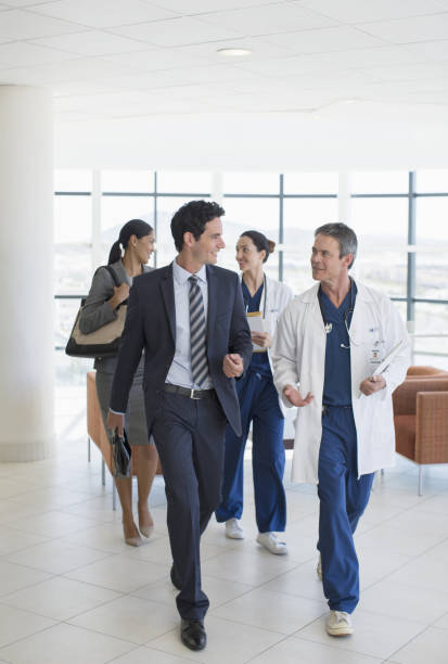 istock Doctors and administrators talking in hospital 184312565