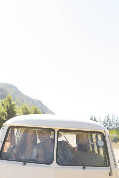 istock Couple driving camper van on rural road 184313051