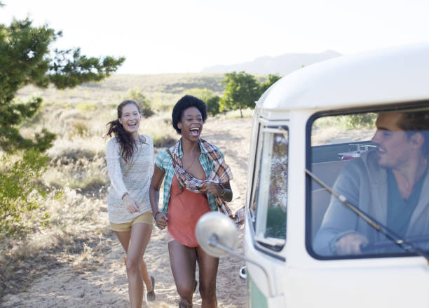 istock Women walking to camper van on rural road 184313067