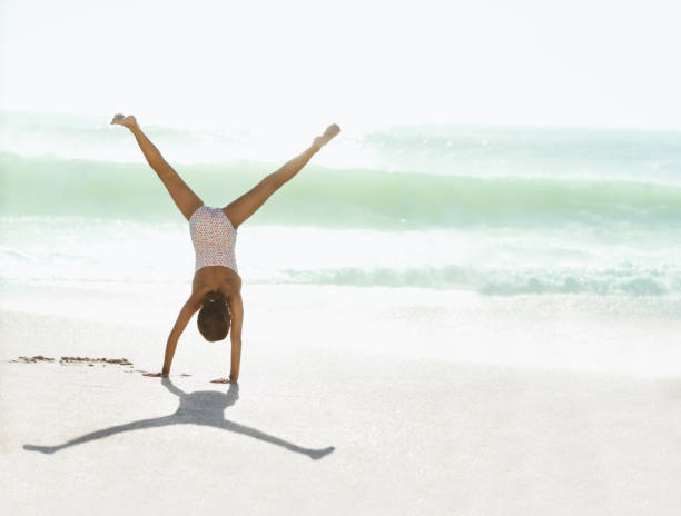 A portrait of a beautiful diverse girl enjoying a sunny day on the beach in the Netherlands
