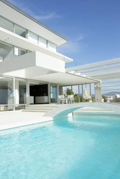istock Swimming pool and modern house 184313563