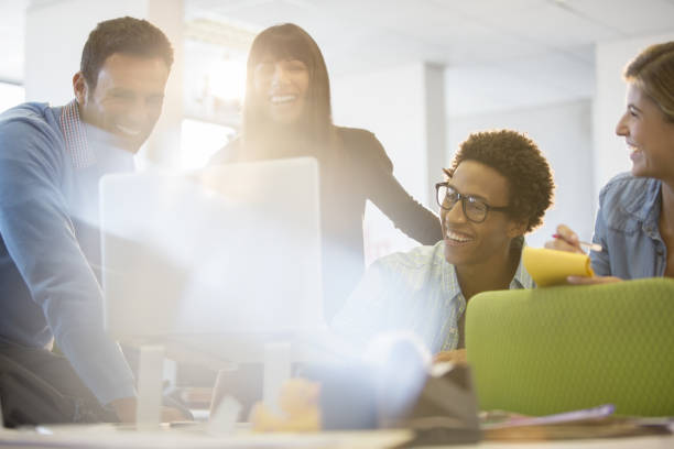 istock Business people laughing in office 184313616