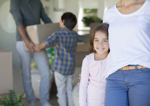 istock Family moving into new house 184314657