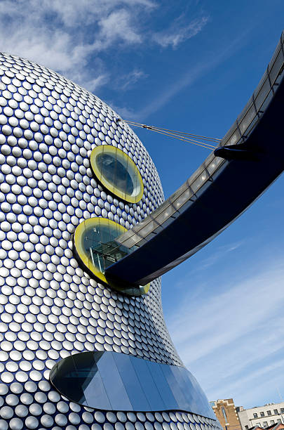 Modern architecture, Birmingham, England "Elevated walkway leading to the futuristic Selfridges department store, The Bullring, Birmingham, West Midlands." bullring stock pictures, royalty-free photos & images