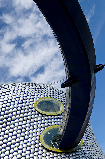 Modern architecture, Birmingham, England "Elevated walkway leading to the futuristic Selfridges department store, The Bullring, Birmingham, West Midlands." bullring stock pictures, royalty-free photos & images