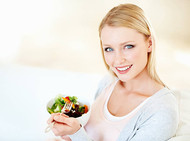 istock Woman having healthy lunch 184314843