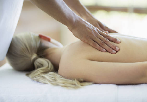 istock Woman receiving massage at spa 184315026