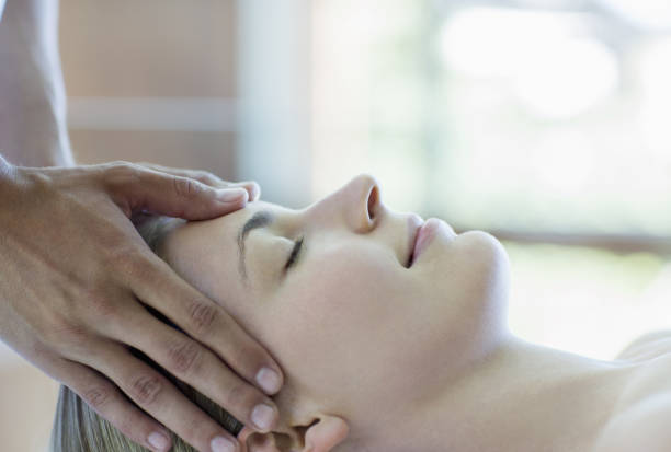 istock Woman having scalp massage in spa 184315310
