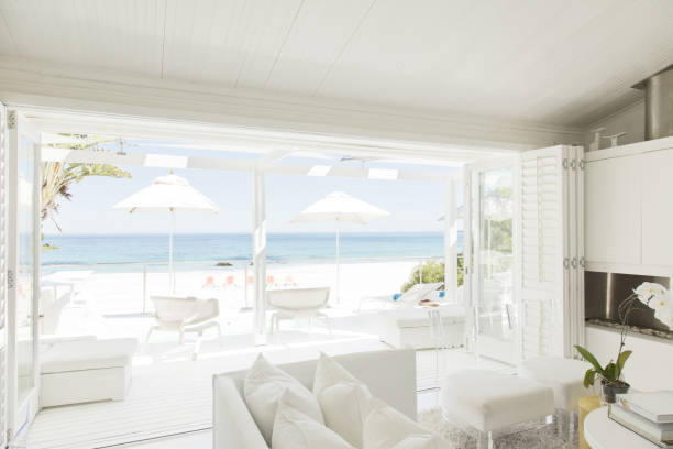 istock Modern living room overlooking beach and ocean 184315504