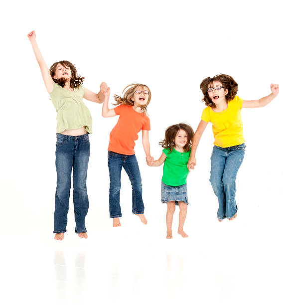 istock Girls Jumping on White Background 184315602
