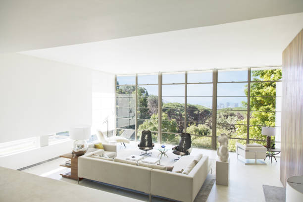 istock Modern living room overlooking trees 184315706