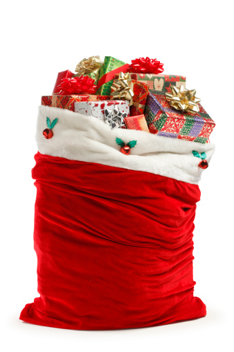 A Santa bag filled with Christmas presents.  Clipping path included.To see more holiday images click on the link below: