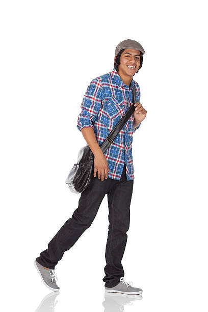 istock Man carrying a shoulder bag and smiling 184317016