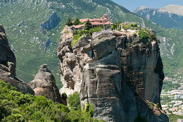 The famous Meteora monastery above the city of Kalampaka. It belongs to the UNESCO World Heritage Site and was set for James Bond movie