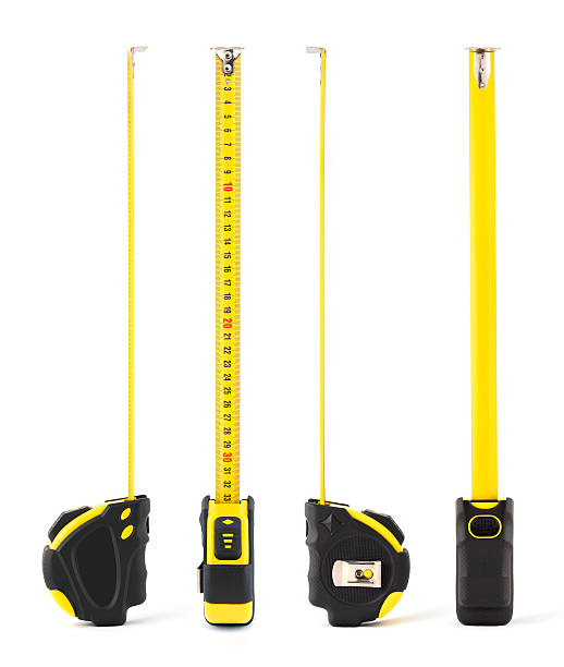 metro a nastro-quattro i lati - tape measure yellow long instrument of measurement foto e immagini stock