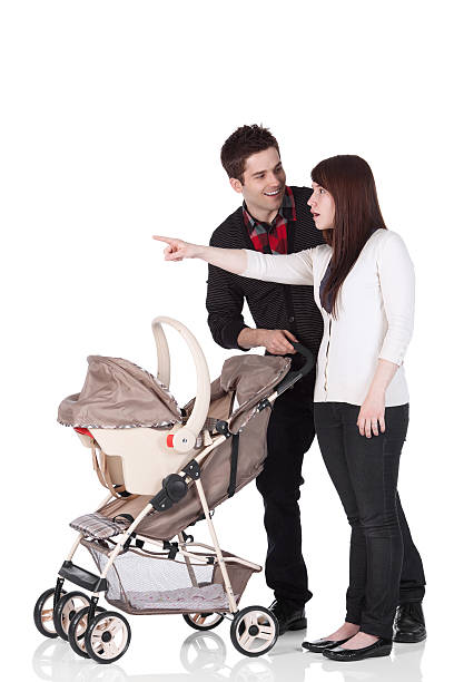 istock Couple with a baby walker 184318132