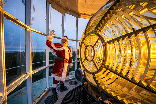 Santa Claus takes selfie in lighthouse beacon