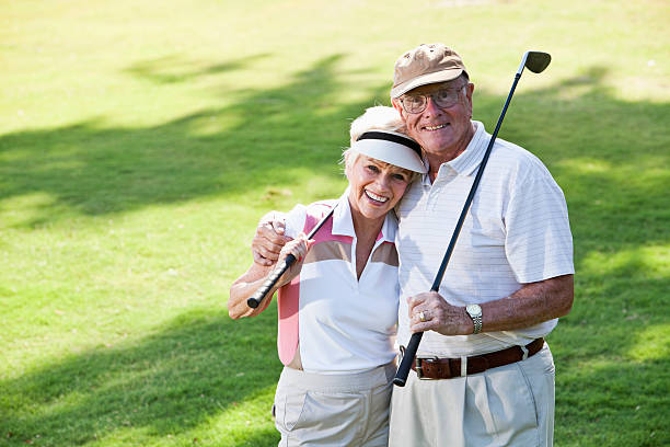 istock Senior couple playing golf 184318834