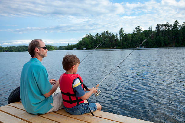 istock Father and Son Fishing 184318883