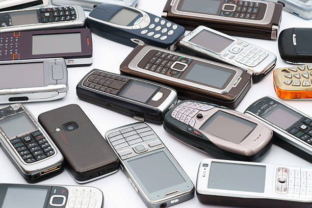 istock Old used cellphones as background - side view 184319188