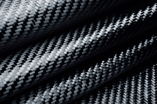 Folded raw carbon fiber cloth.