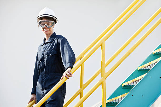 istock Industrial worker on metal staircase 184319358
