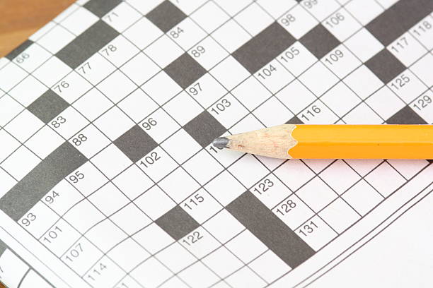 istock Crossword Puzzle and Pencil 184319382