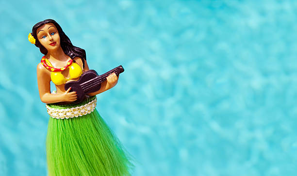 istock Hula figurine set against swimming pool 184319466