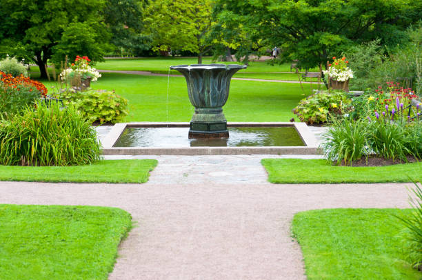 istock Decorative urn and pond in garden 184319730