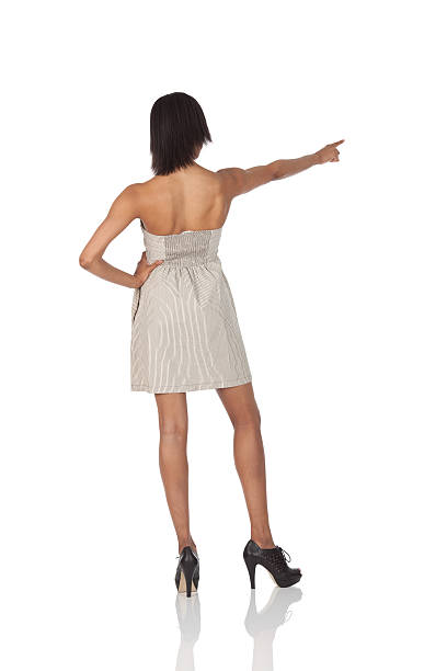 istock Rear view of a woman pointing 184319915