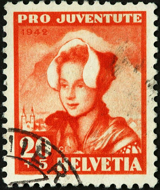 istock woman with bonnet on a very old Swiss postage stamp 184320133