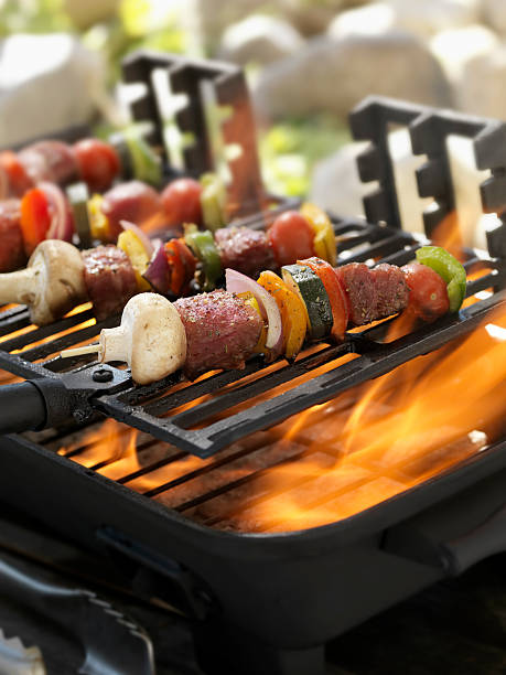istock Beef and Vegetable Kabobs on a Outdoor BBQ 184320174