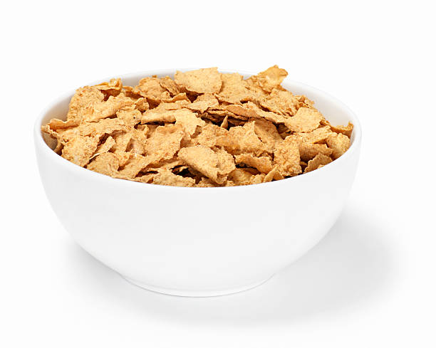 Bran Flakes Breakfast Cereal Bran Flakes Breakfast Cereal -Photographed on Hasselblad H1-22mb Camera bran flakes stock pictures, royalty-free photos & images